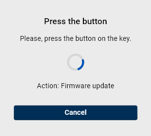 A dialog instructing the user to press the button on the token