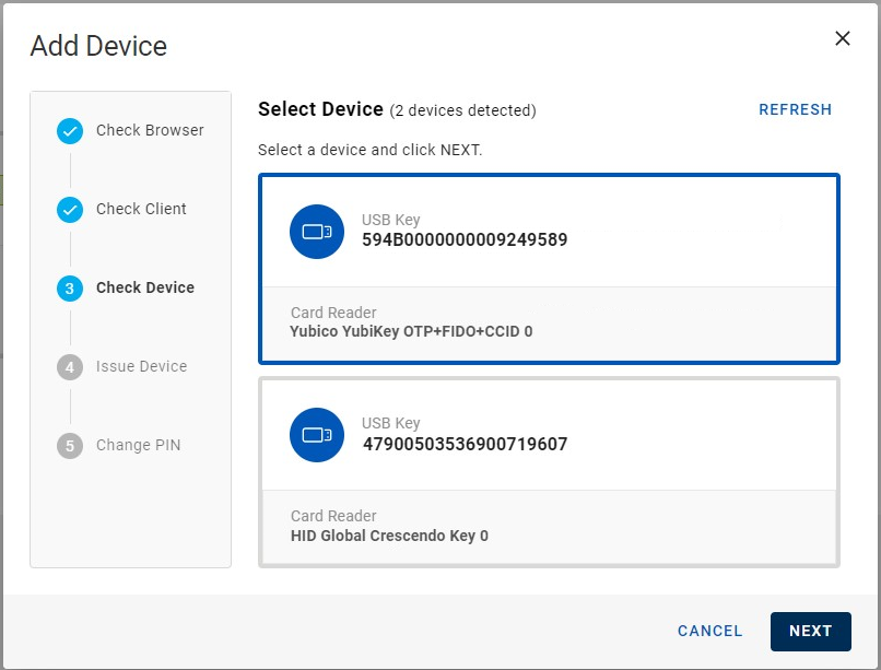 Add Device dialog box during Check Device step with one device selected among two devices displayed, with a Refresh button in the top right corner and with a Cancel button and a Next button in the bottom right corner